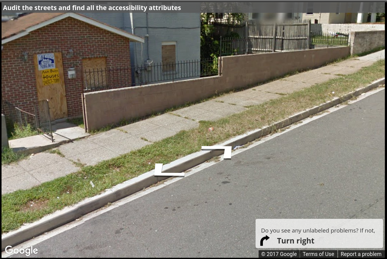 A Street View image of a sidewalk with grass between sidewalk blocks